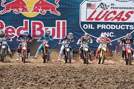 Riders hit the gas as the gates fall on Saturday at the Ironman National Lucas Oil Pro Motocross.